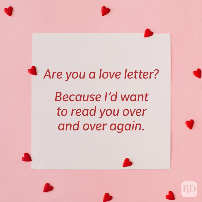 Valentine’s Day Pickup Line on paper background with scattered hearts around it background