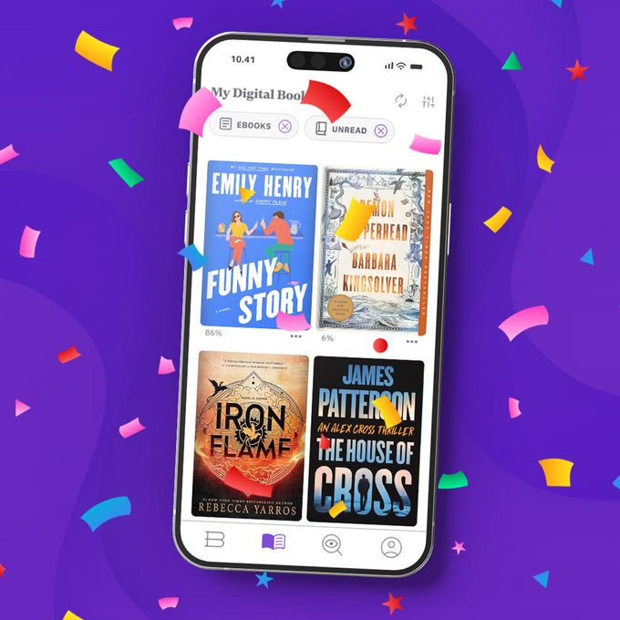 Phone with ebook covers on a purple background with confetti