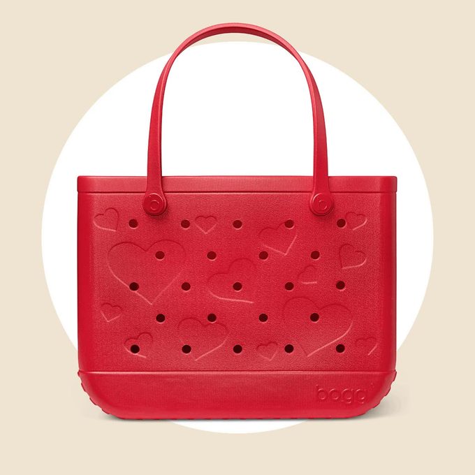 Original Bogg Bright Red bag on a tan and white background