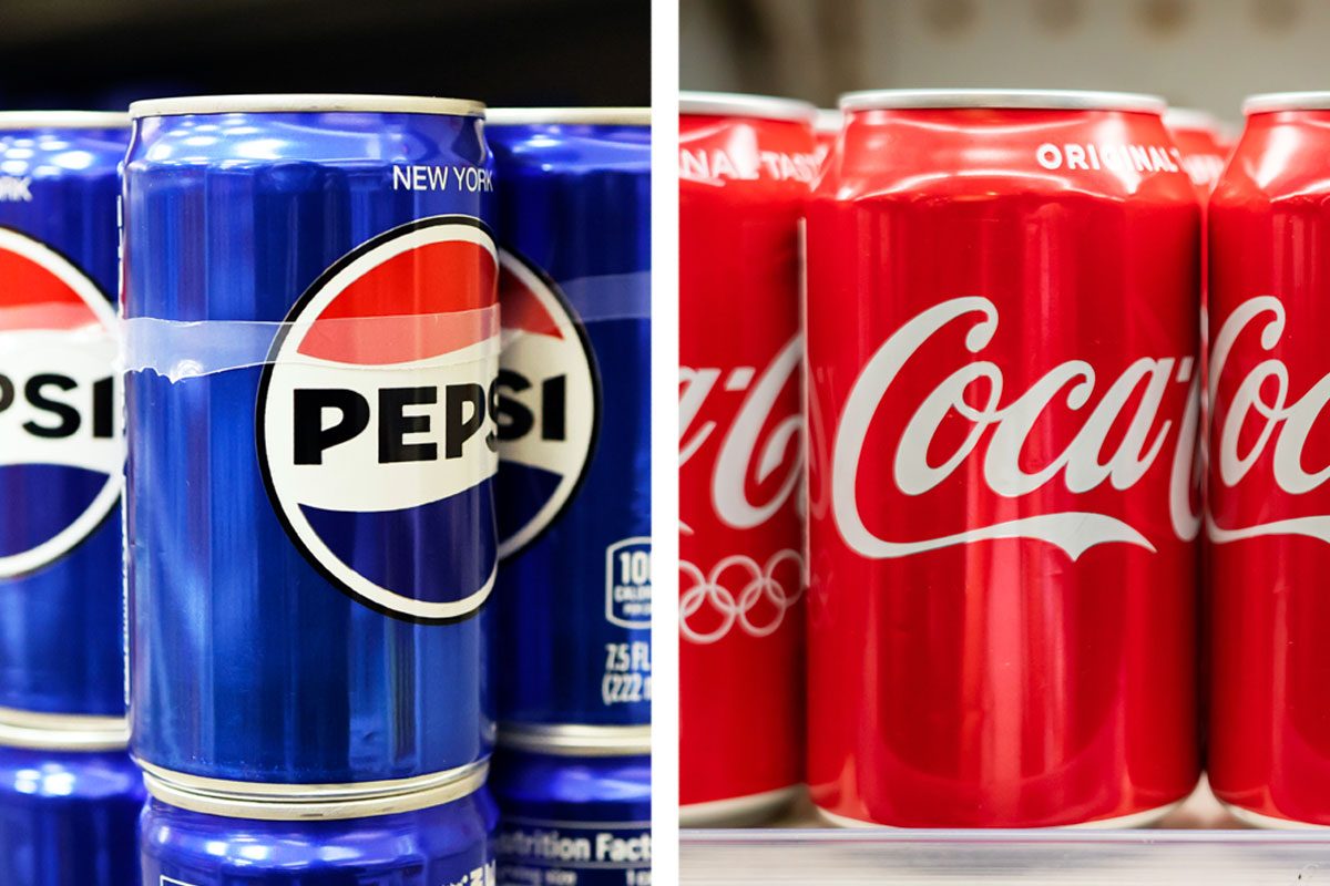 Cans Of Pepsi And Coca Cola