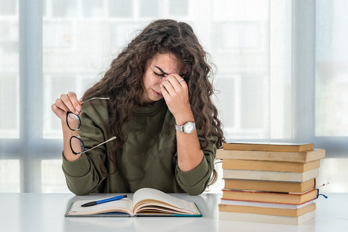 girl tired after reading