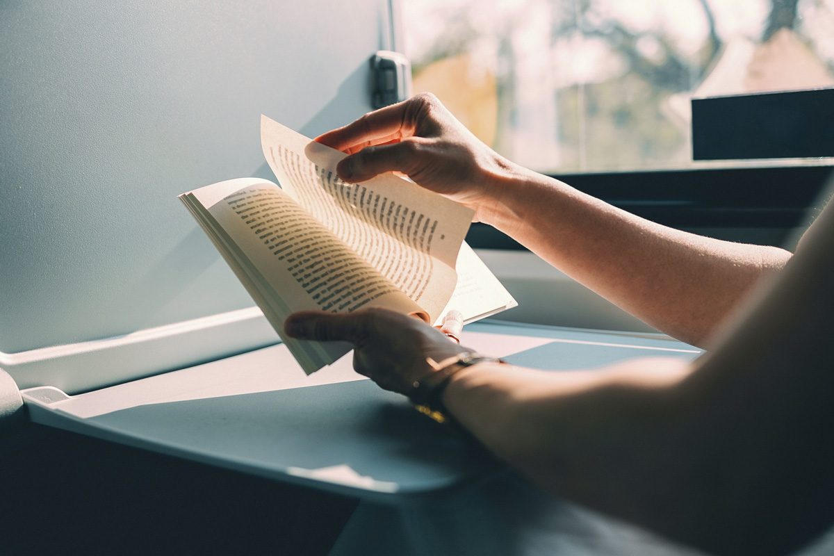 woman reading by a window