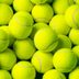 Here's the Real Reason Why Tennis Balls Are Bright Yellow (And Nope, They Weren't Always That Color!)